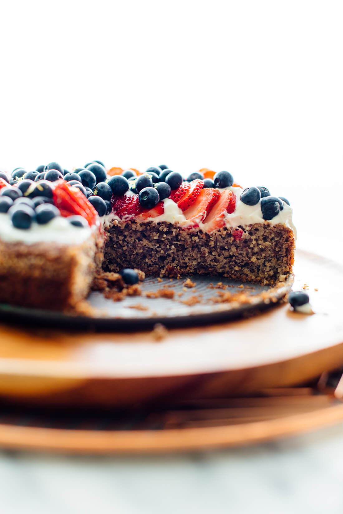 lemon almond cake with berries side view